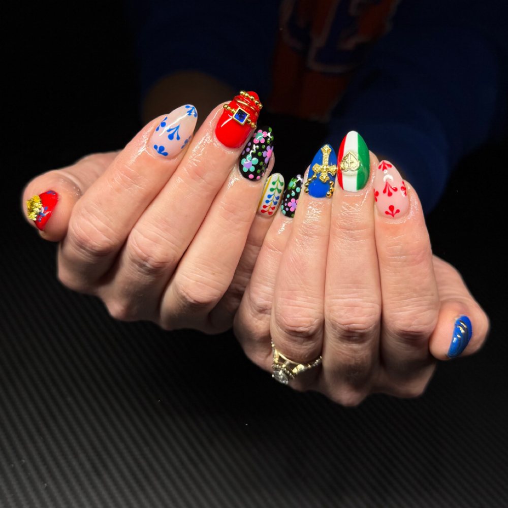 A full set of detailed hand-painted nail art by Gracie